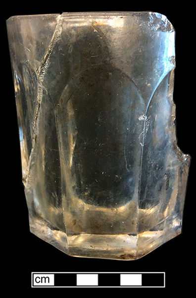 Colorless leaded glass panelled tumbler. Octagonal base. 3.5” vessel height; 3.25” rim diameter; 2.5” base diameter. 18BC27-F17